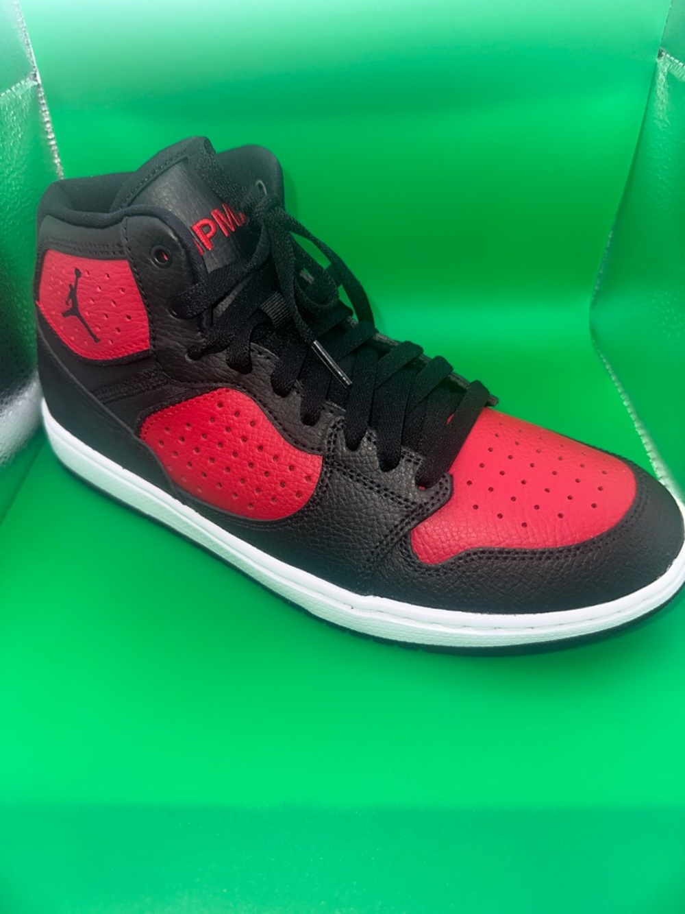 Jordan High-Top Sneakers in Black and Red
